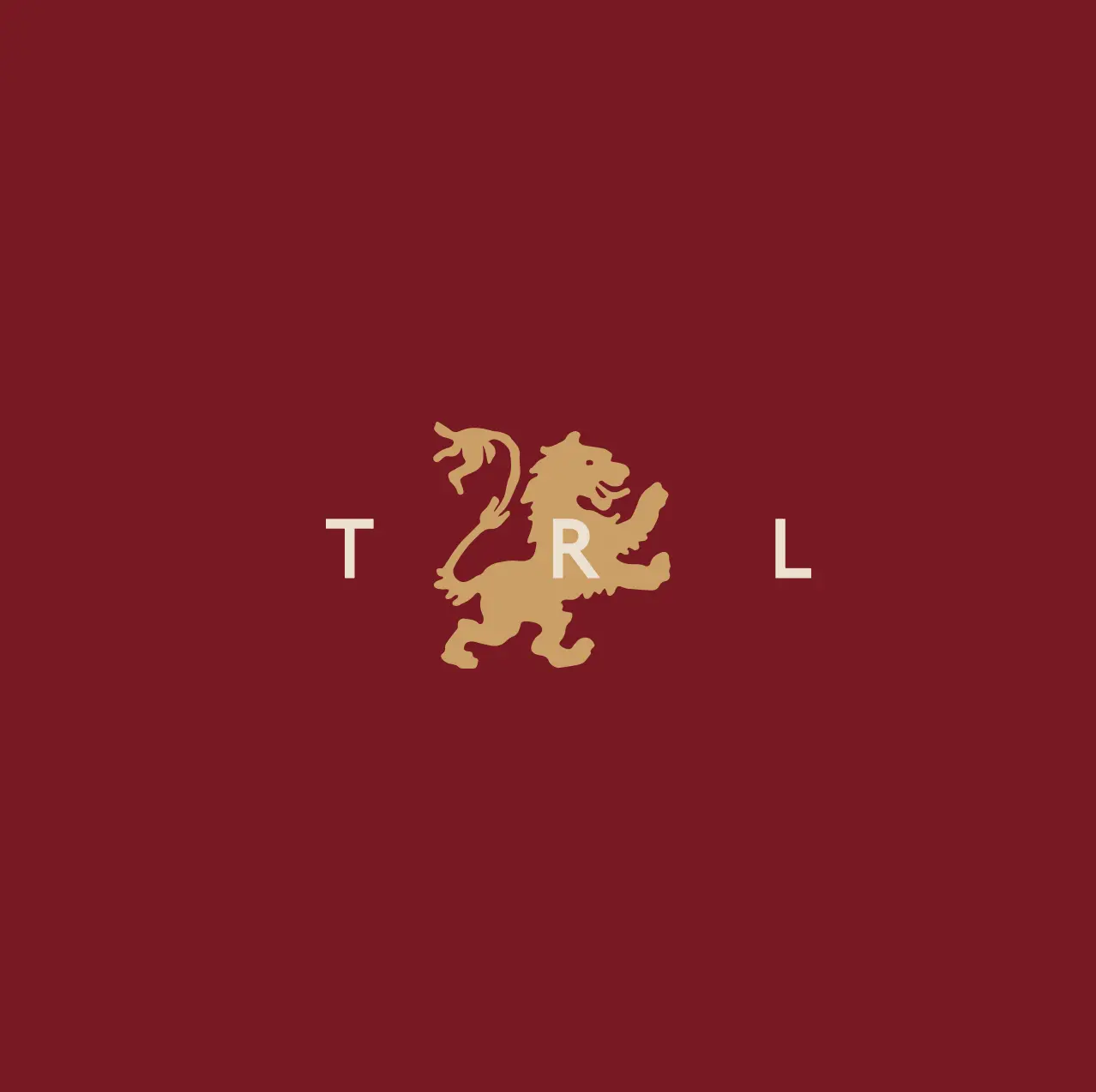 Gold heraldic lion centred on a maroon background with the letters T, R and L spaced around it.