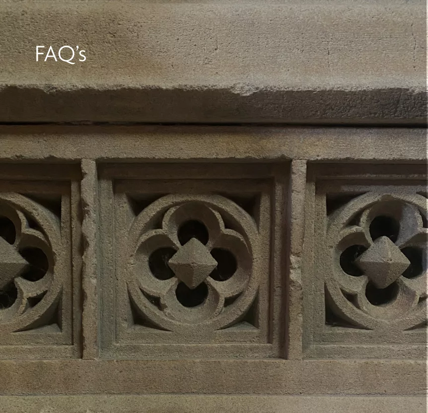 Sandstone frieze with three square panels each showing a quatrefoil and central diamond boss, with "FAQ's" text in the top-left.