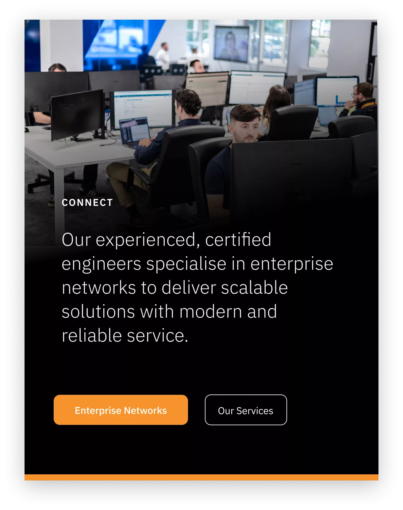 Engineers in an open-plan office at multi-monitor desks with overlay text about enterprise networks and two buttons
