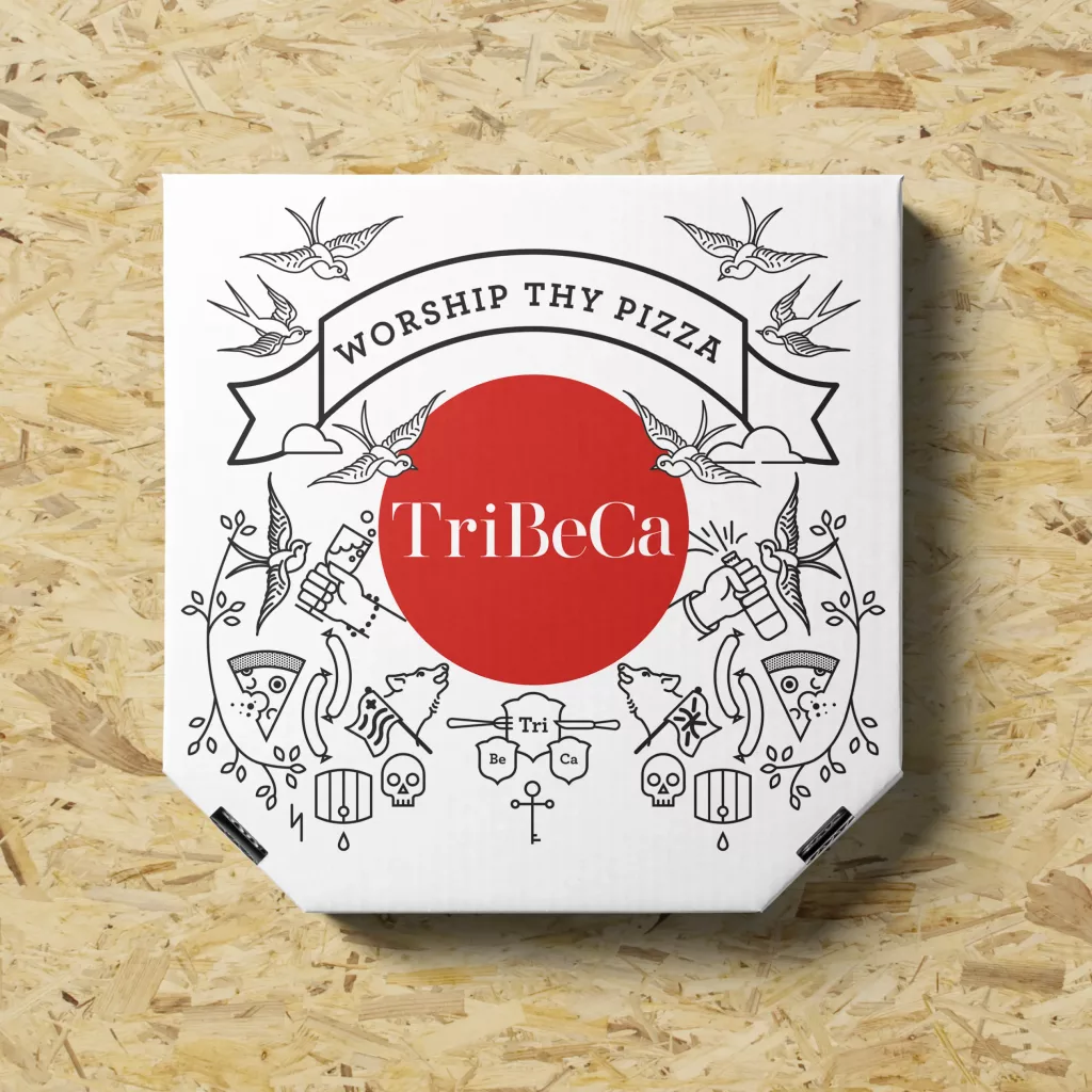 White pizza box with red circle reading TriBeCa and black line illustrations, plus banner saying 'Worship Thy Pizza'